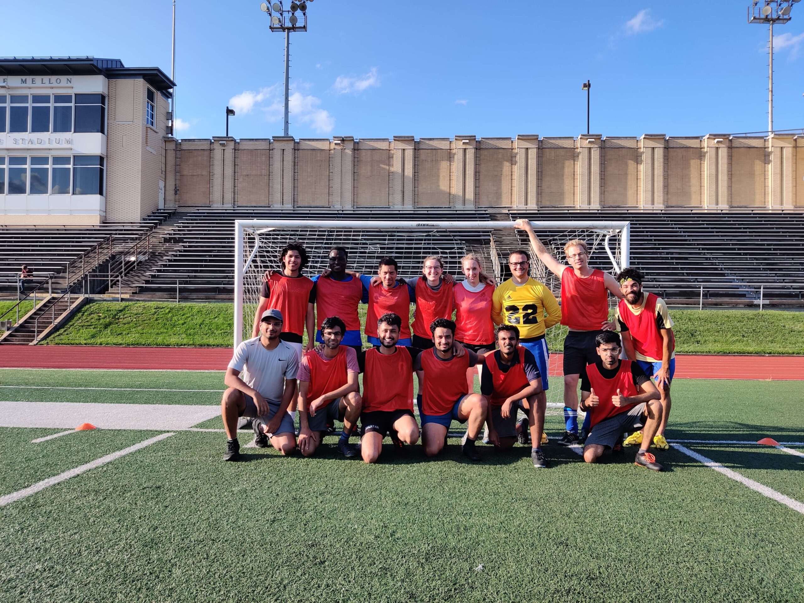 "This team is RIFC. We won the GSA Summer Soccer League. We were losing the first game 3-0 at half time. We scored 1 in the second half to make it 3-1. Since then, we went on to win every game but one and eventually lift the trophy. I scored a goal with my head and also an own goal. It was a good experience getting to know people from multiple departments and having a more routine of playing the game I love."